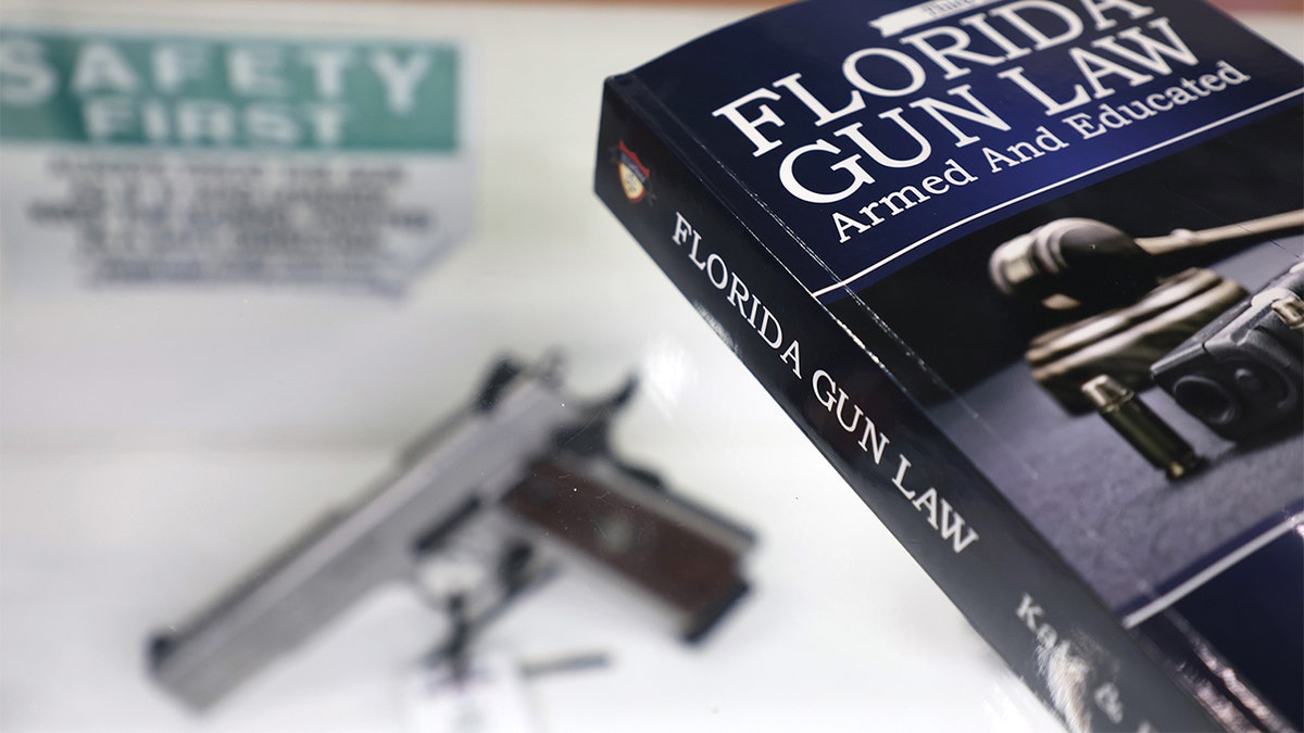 A Florida gun law book displayed at Top Shottas Guns and Tactical Supply store in Fort Lauderdale
