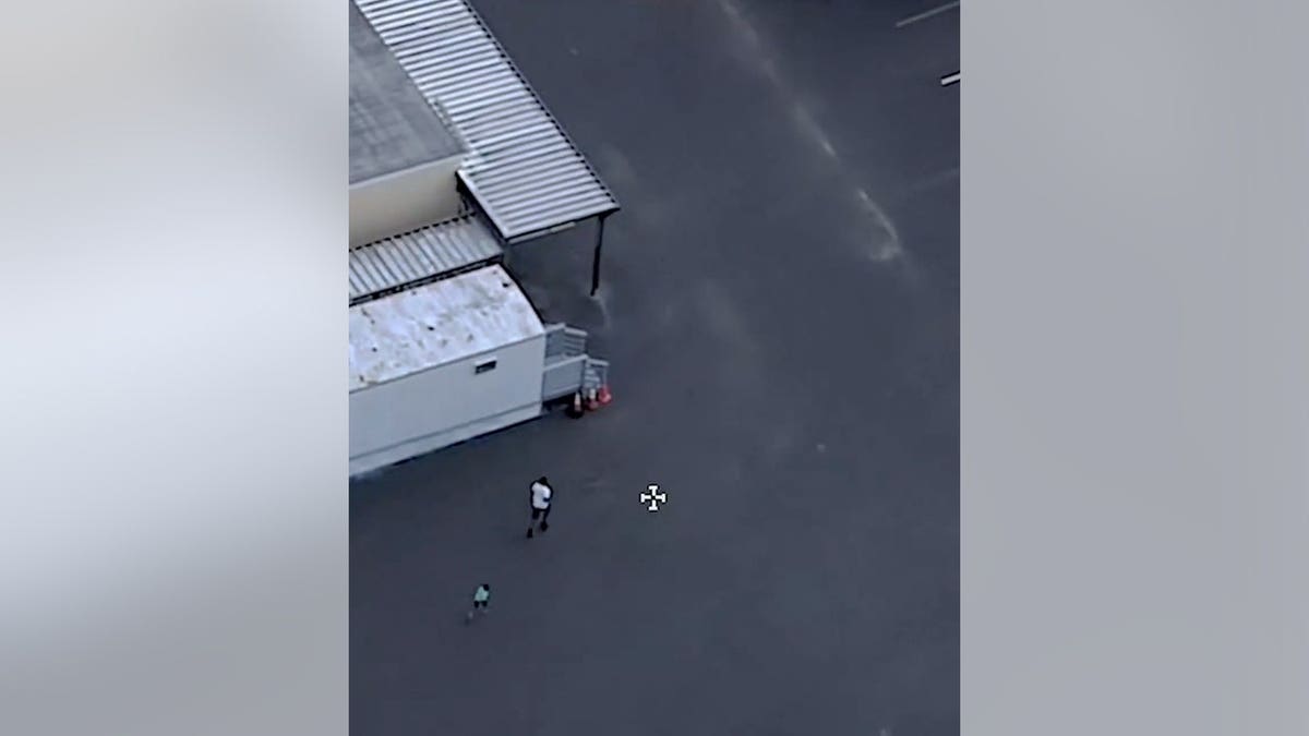 man and child running