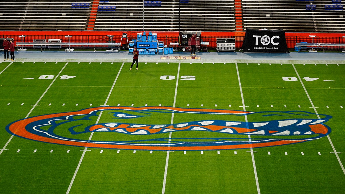 Florida Gators logo displayed on the field at Ben Hill Griffin Stadium