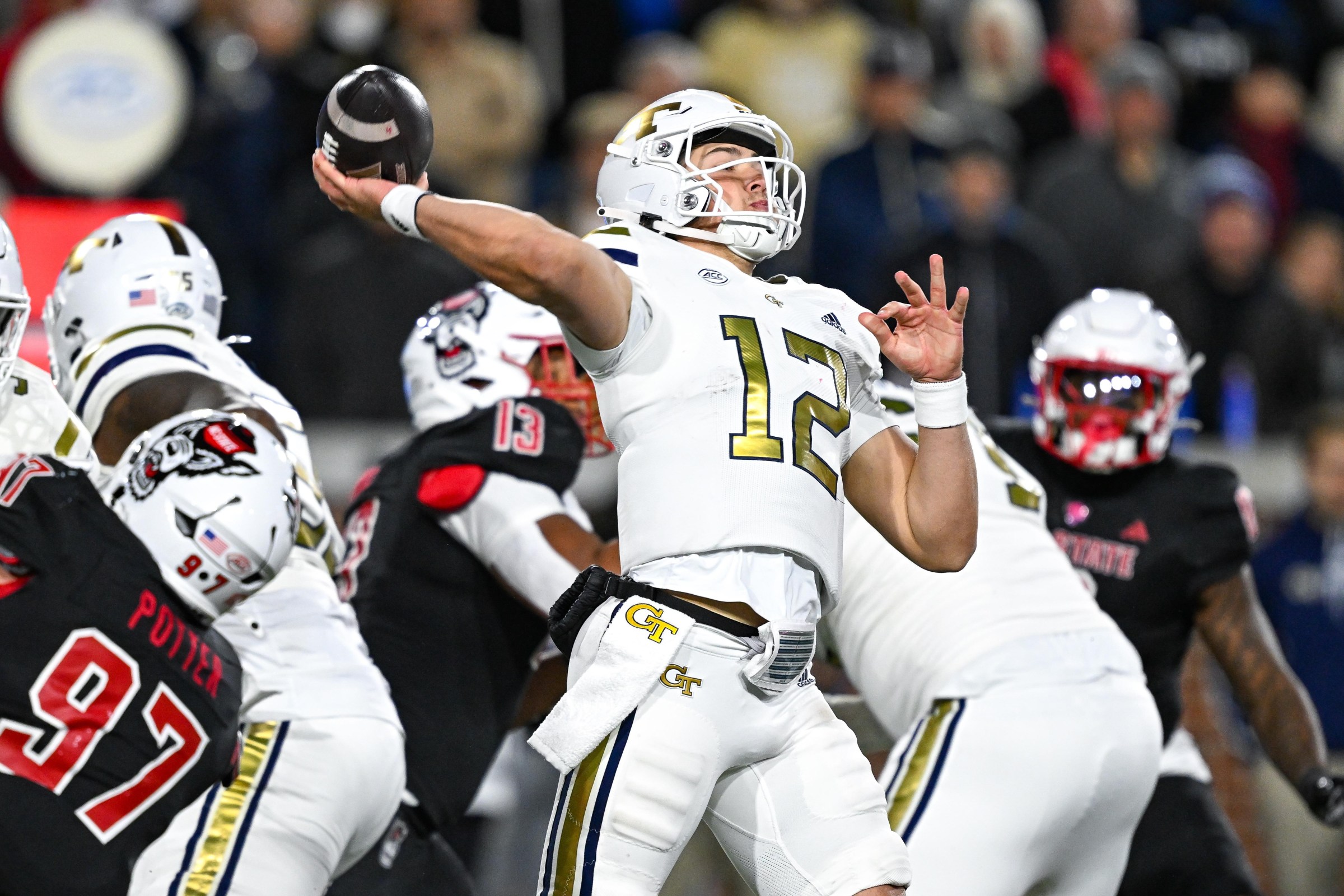 ATLANTA, GA - NOVEMBER 21: Georgia Tech quarterback Aaron Philo (12) throws a pass during the college football game between the North Carolina State Wolfpack and the Georgia Tech Yellow Jackets on November 21st, 2024 at Bobby Dodd Stadium in Atlanta, GA. (Photo by Rich von Biberstein/Icon Sportswire via Getty Images)