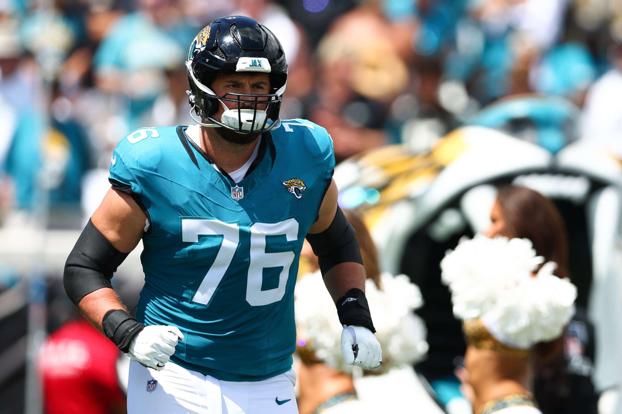 JACKSONVILLE, FLORIDA - SEPTEMBER 07: Ezra Cleveland #76 of the Jacksonville Jaguars is introduced prior to a game against the Carolina Panthers at EverBank Stadium on September 07, 2025 in Jacksonville, Florida. (Photo by Megan Briggs/Getty Images)