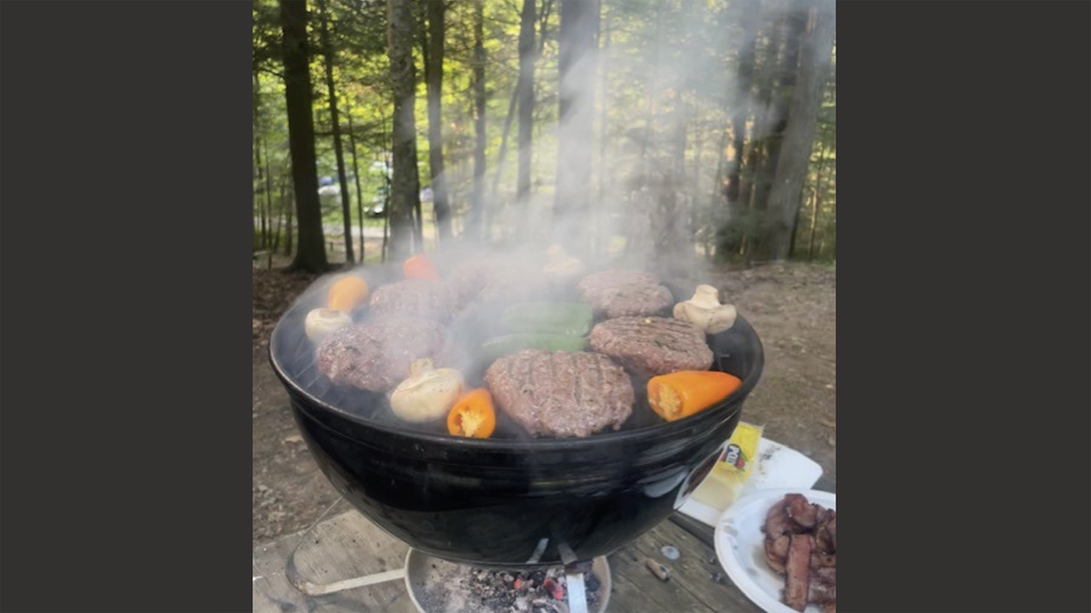 Screencaps reader Guy put his meat on a grill while camping.