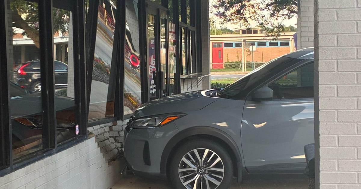 Two injured after car crashes into an Arlington restaurant