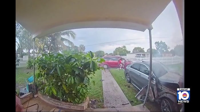 Video shows car plowing into Miami-Dade house after crash