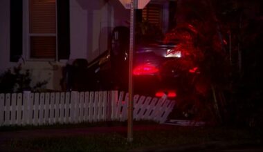 Hollywood rollover crash sends car into home, narrowly missing sleeping residents