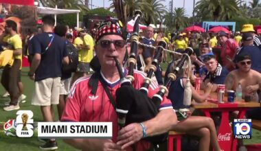 Brazilian and Scottish FIFA World Cup fans celebrate together at Miami Stadium’s fan zone