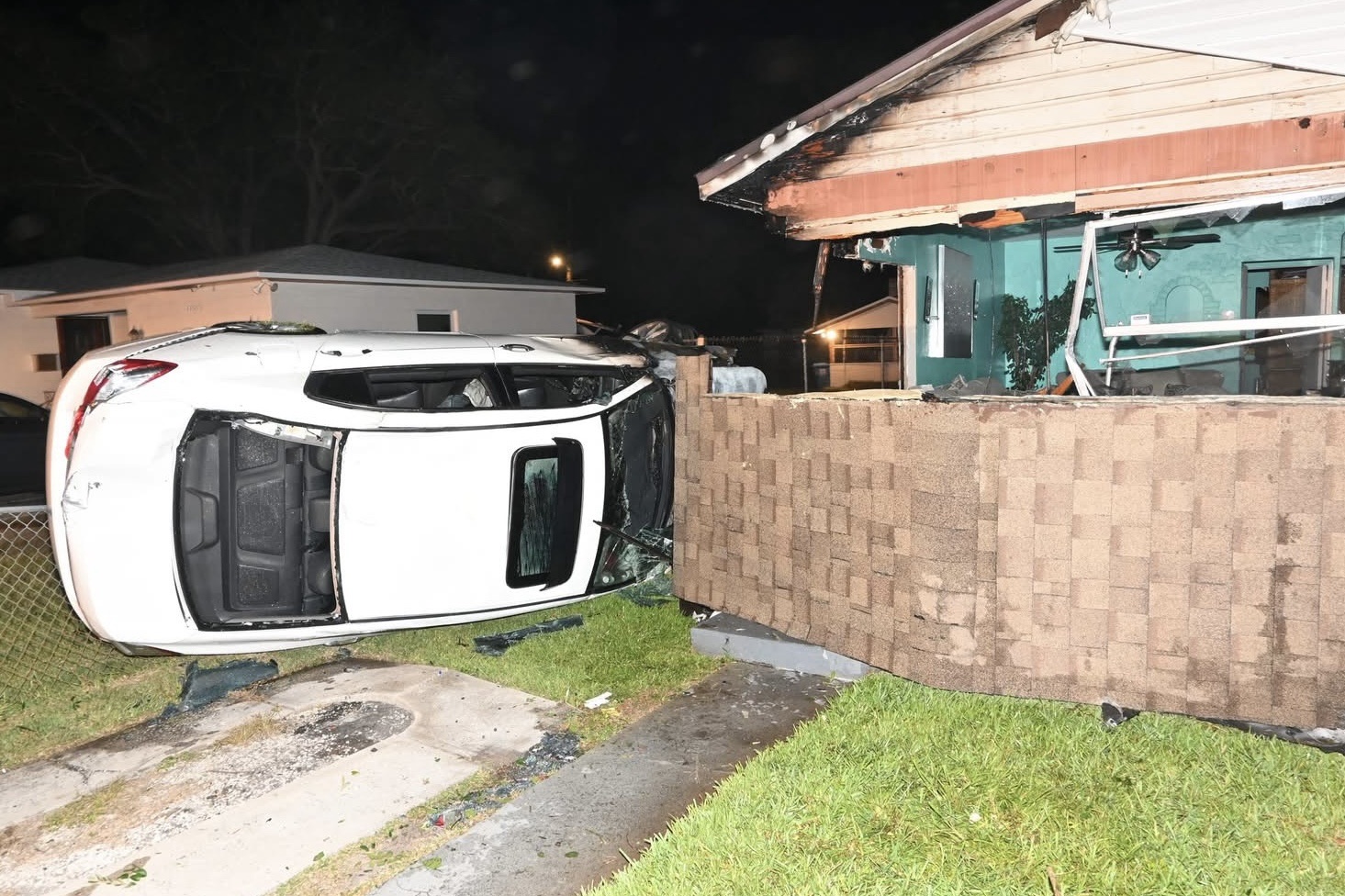 Arrest Made After Car Crashes Into St. Petersburg Home, Sparks Fire