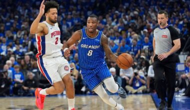 Magic forward Jamal Cain (8) drives around Pistons guard Cade Cunningham (2) on April 27, 2026 during Game 4 of the teams' first-round NBA playoff series. (AP Photo/John Raoux)