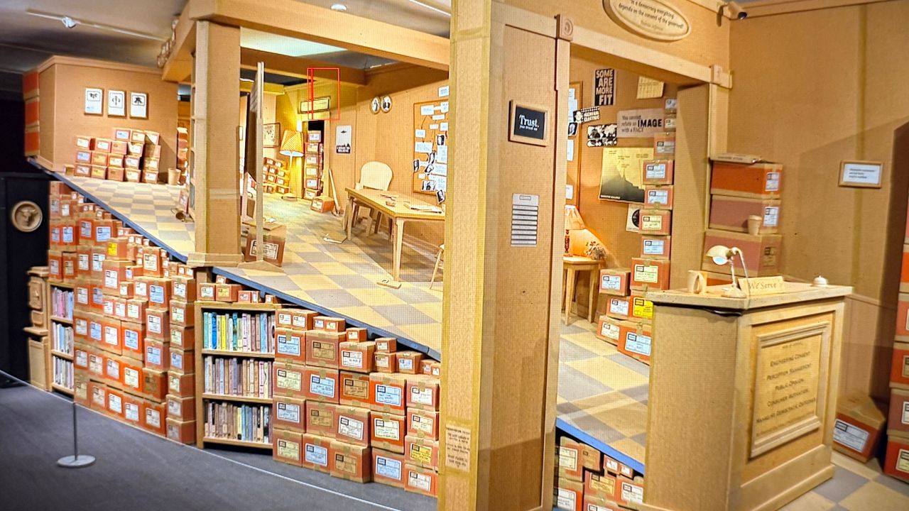 This is a photo of the wonky-slanted installation The Last Library IV. (Spectrum News/Virginia Johnson)