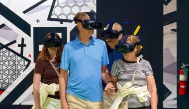 Guests hold on tightly, as this VR experience takes reality to a new dimension. (Spectrum News/Allison Walker)