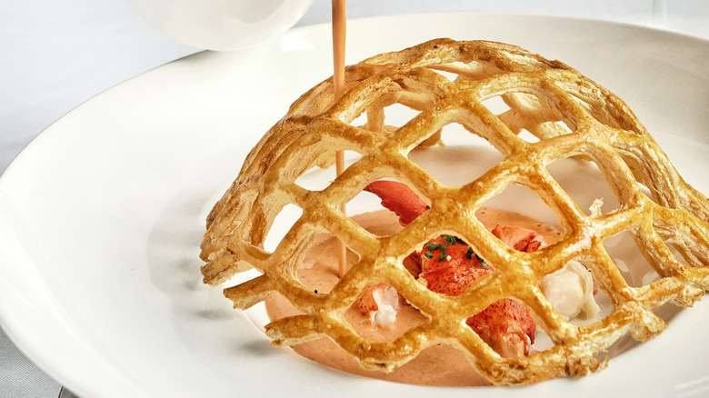 Lobster bisque with sherry and puff pastry dome