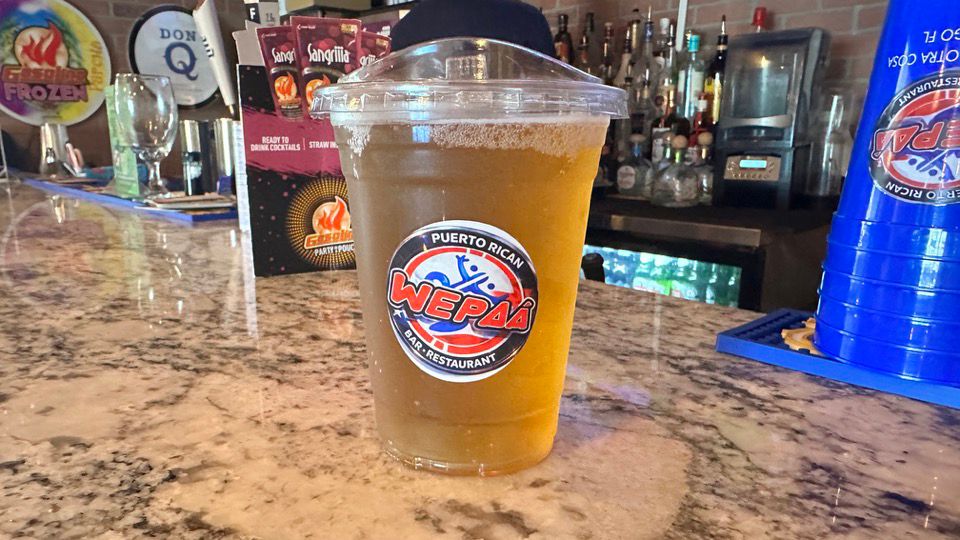 A beverage with the Wepaa logo sticker. (Spectrum News)