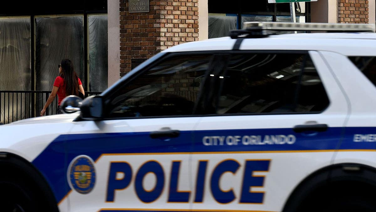 Police officer patrolling Orange Avenue and Central Boulevard in Orlando