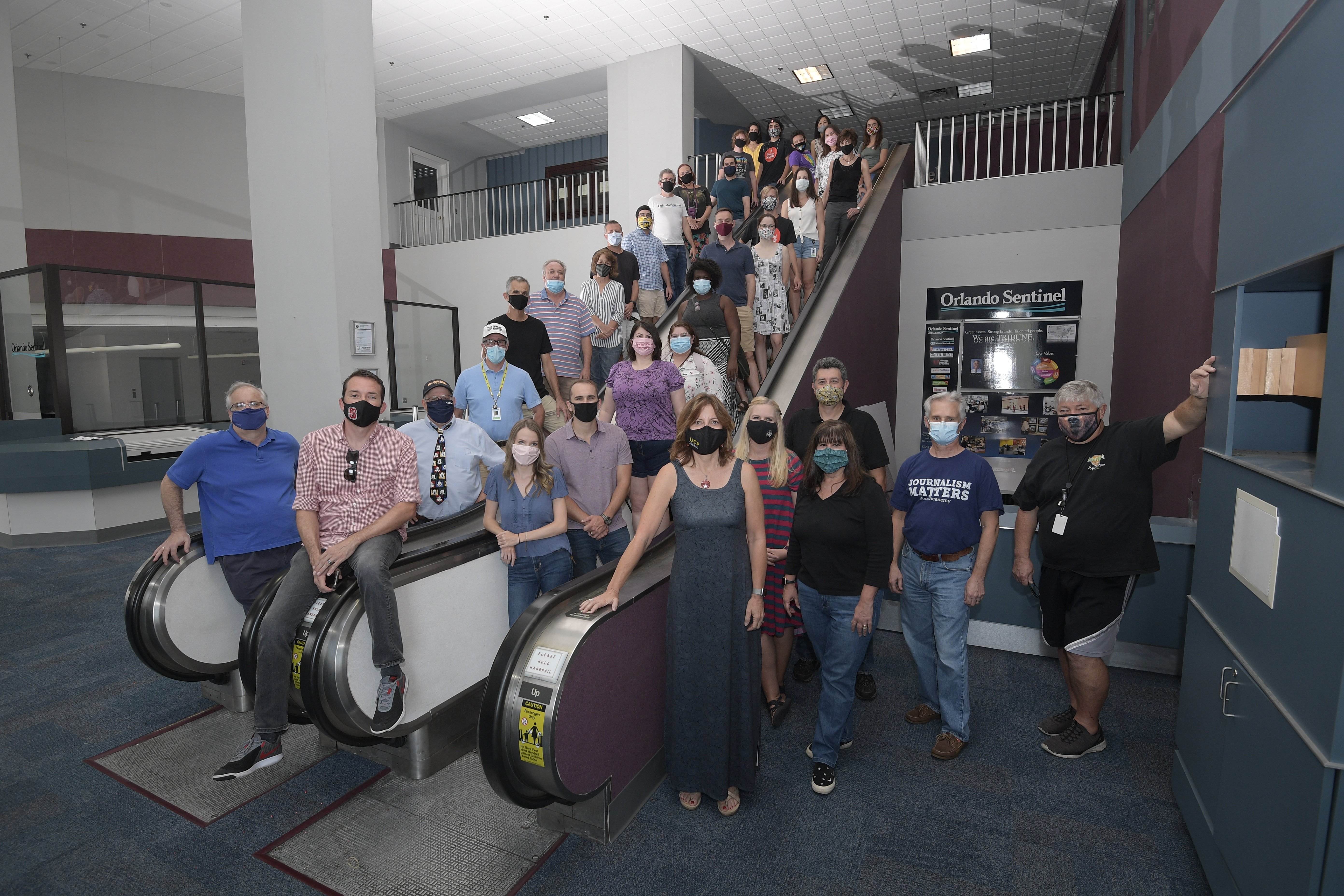 Members of the Orlando Sentinel newsroom gathered on Friday Aug. 28, 2020, to say goodbye to 633 N. Orange, the building that had been the newspaper's home since 1951. The staff had been working remotely since March when the COVID-19 pandemic hit hard. (Orlando Sentinel File)