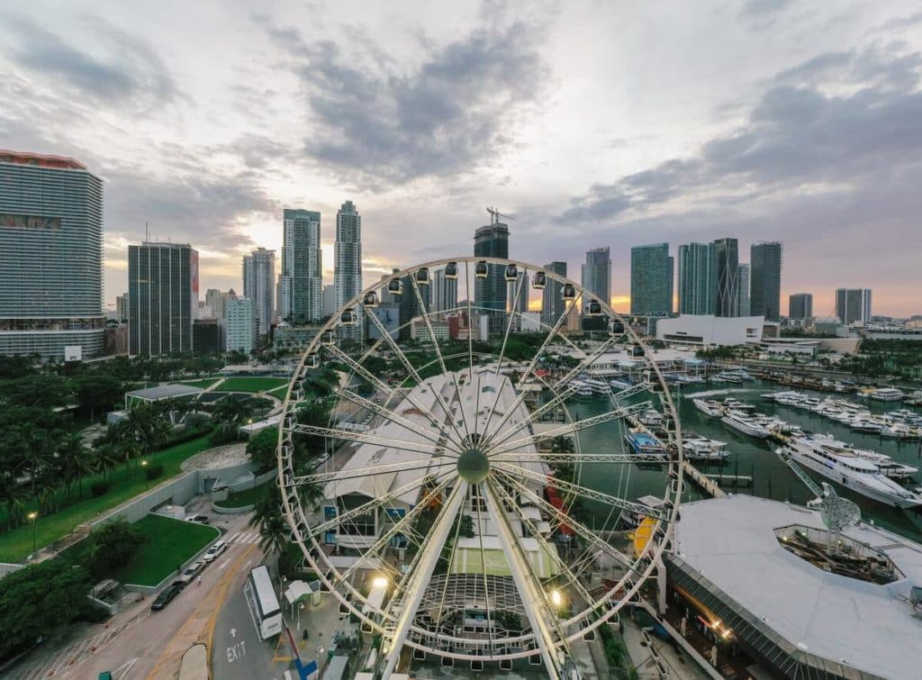 The Skyviews wheel at Bayside Marketplace with the Miami skyline in the background