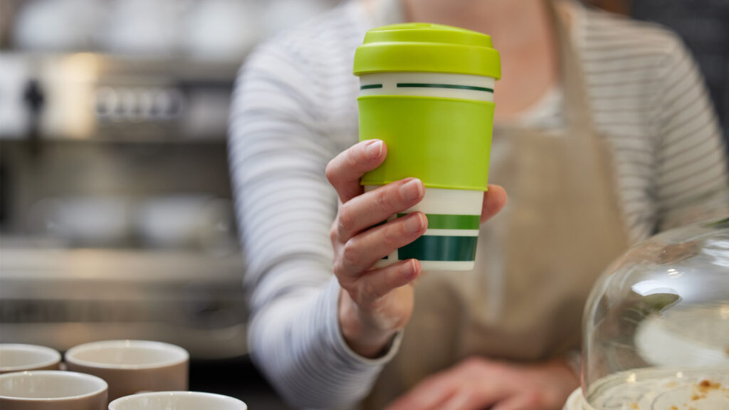 A reusable cup at a coffee shop (iStock image)