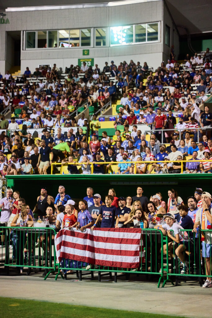 People at a soccer stadium