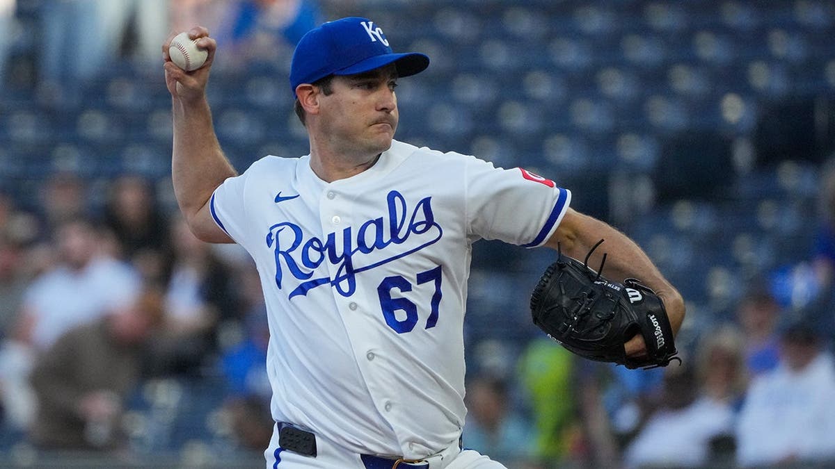 Kansas City Royals pitcher Seth Lugo delivering a pitch at Kauffman Stadium