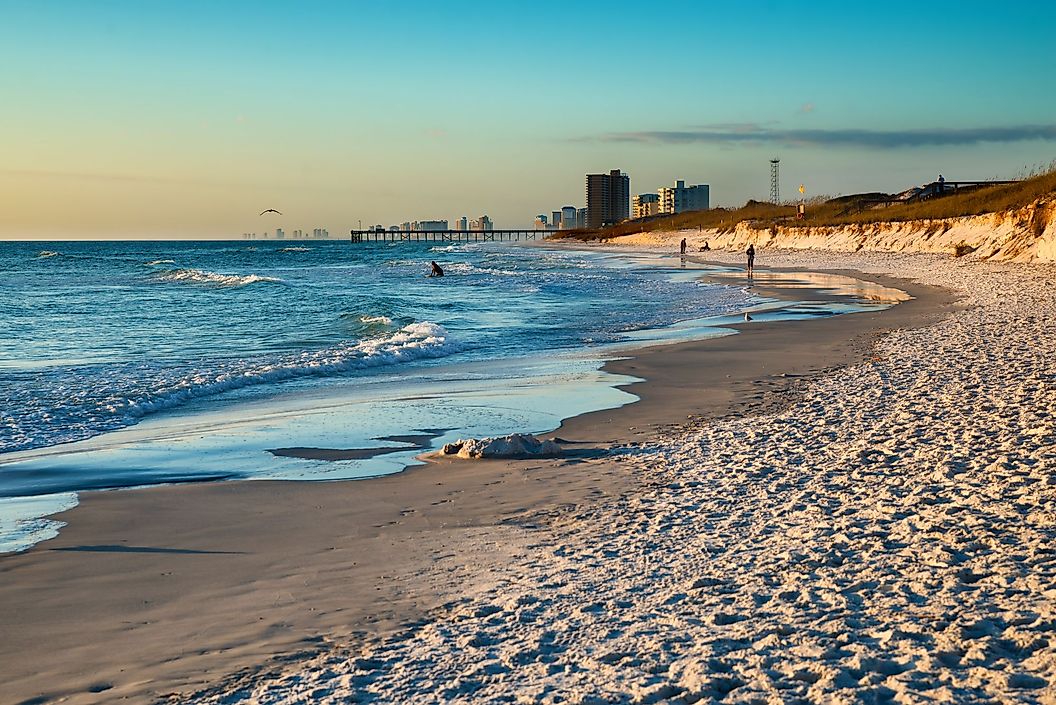 Beach scene in Panama City Beach, Florida, at sunset.