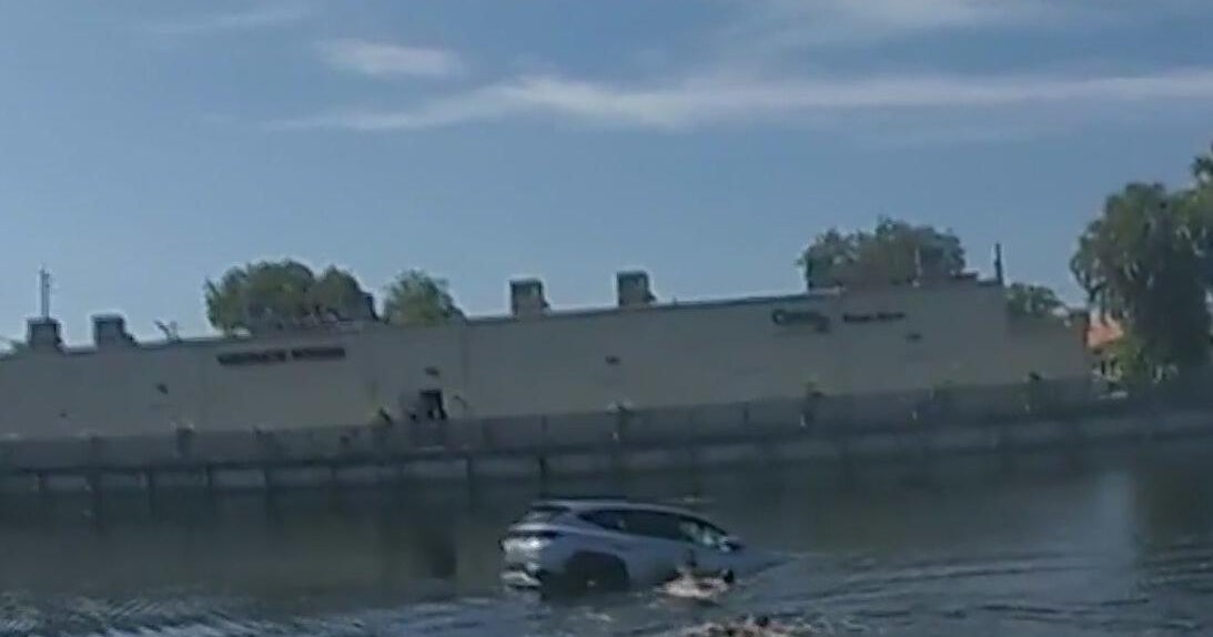 New bodycam video shows daring rescue of woman from sinking car in Broward canal