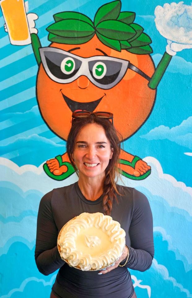 Lisa Roth celebrates winning the South Florida Sun Sentinel Best of South Florida Dining series for best Key lime pie at Bob Roth's New River Groves on Thursday, June 18, 2026. (Mike Stocker/South Florida Sun Sentinel)