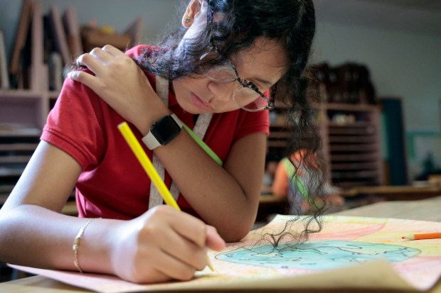 Jimena Realegeno Lara draws during visual arts class at North Andrews Gardens Elementary School of the Arts in Fort Lauderdale on Thursday, May 28, 2026. (Amy Beth Bennett / South Florida Sun Sentinel)