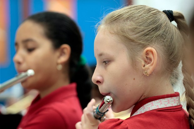 Yuliia Shakas plays flute in advanced band class at North Andrews Gardens Elementary School of the Arts in Fort Lauderdale on Thursday, May 28, 2026. (Amy Beth Bennett / South Florida Sun Sentinel)