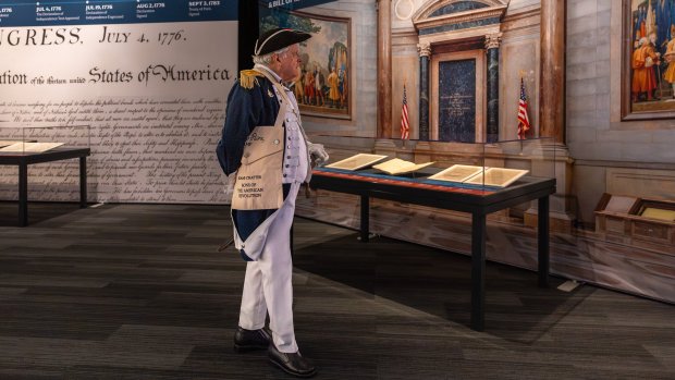 David Mitchell, commander of the Color Guard for the Sons of the American Revolution Miami Chapter, walks through the "Documents that Forged a Nation" exhibit during a press preview at the Museum of Miami in Miami, Fla., on Wednesday, June 17, 2026. (Marra X. Finkelstein/Miami Herald)