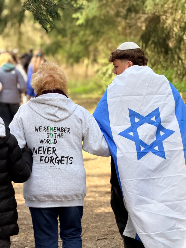 A Broward County student walks with a survivor during the March of the Living 2026. (March of the Living/Courtesy)