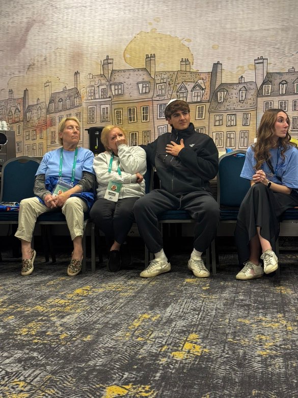 Austin Ben-Shmuel, second from right, with Holocaust survivor, Norma Menasche during a nightly "bus session" during March of the Living. (Ben-Shmuel/Courtesy)