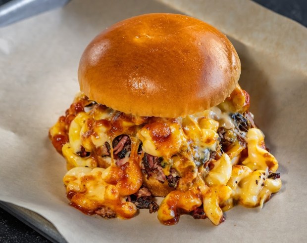 The Big Daddy sandwich (pulled pork, smoked mac 'n' cheese, brisket) at Fat Boyz Barbecue in Fort Lauderdale, one of 119 South Florida eateries that notched perfect restaurant inspections in Sept. 2024. (Fat Boyz Barbecue / Courtesy)