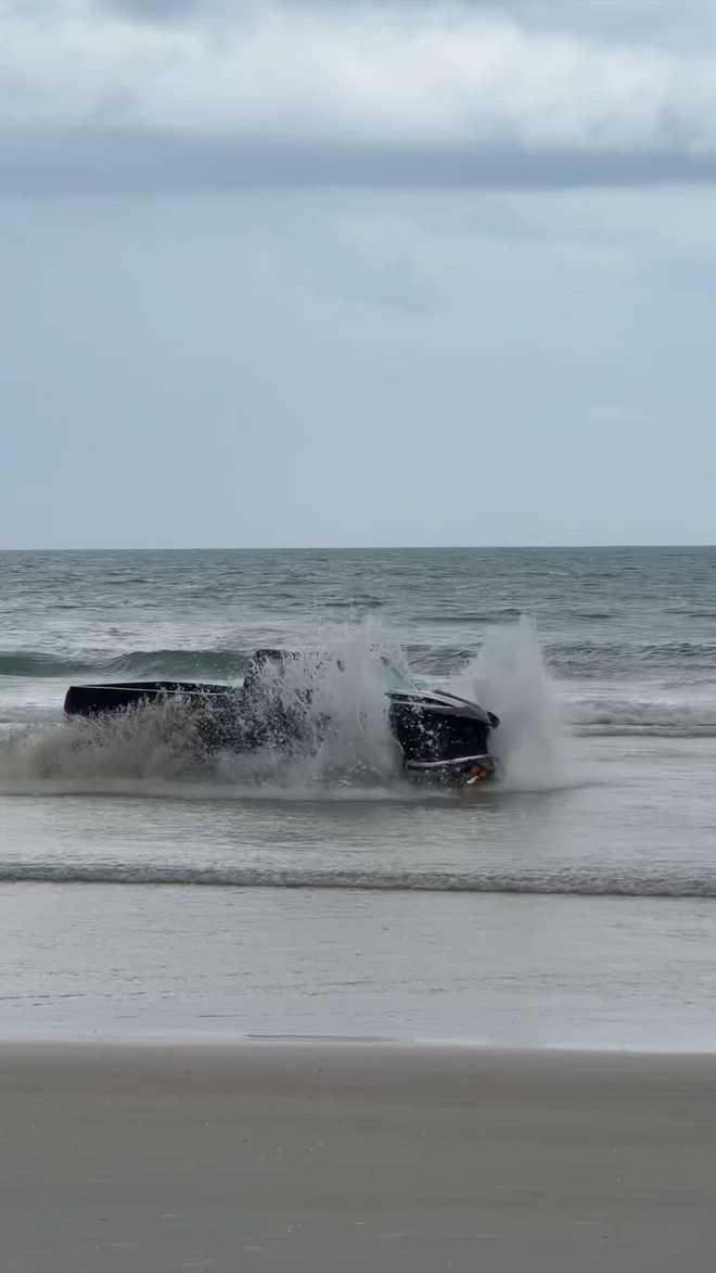 Pickup truck drives into ocean at Volusia County Shores