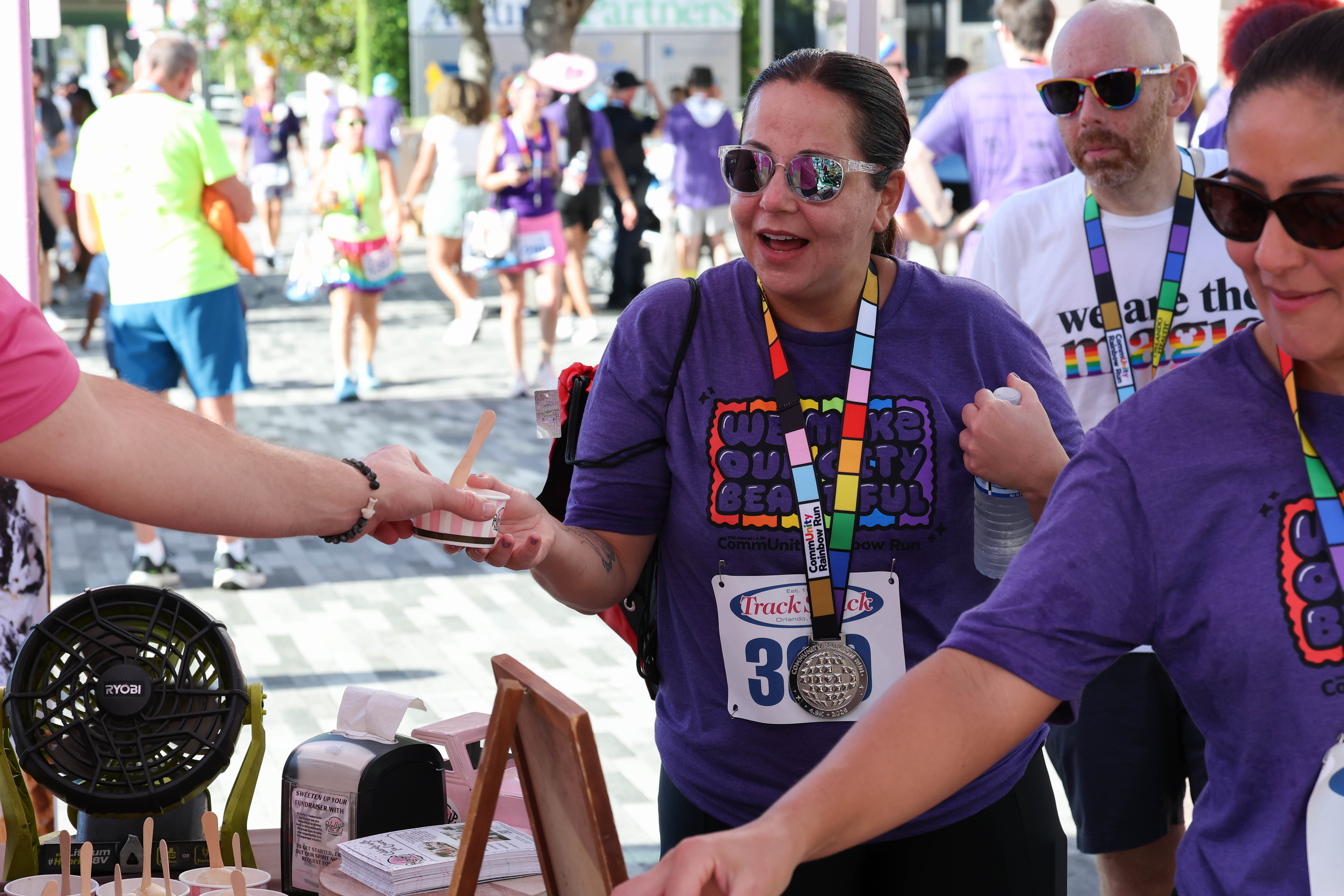 Runners refuel with free ice cream from Kellyâs during the...
