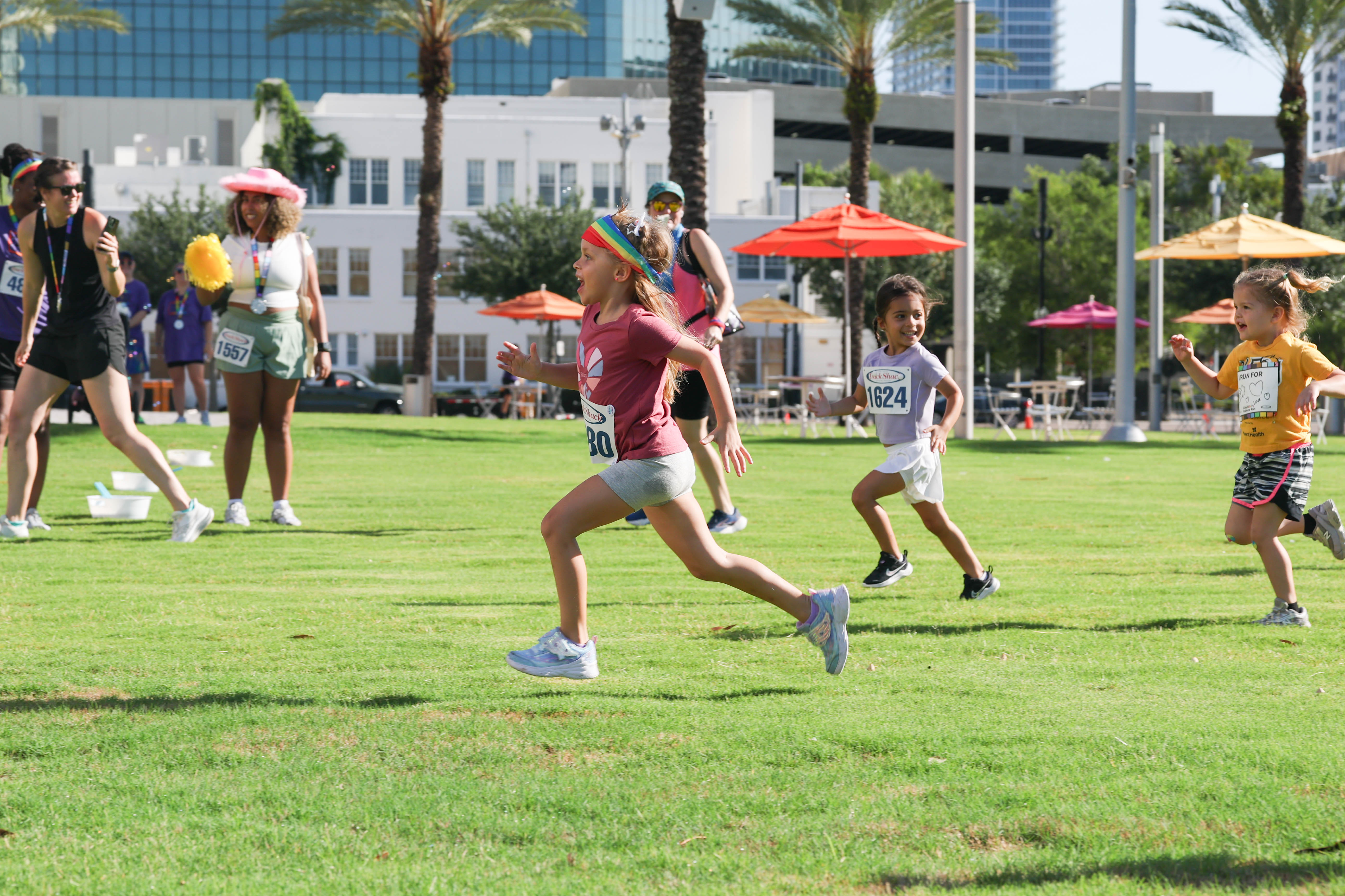 Runner takes the lead at the Kid Run during the...