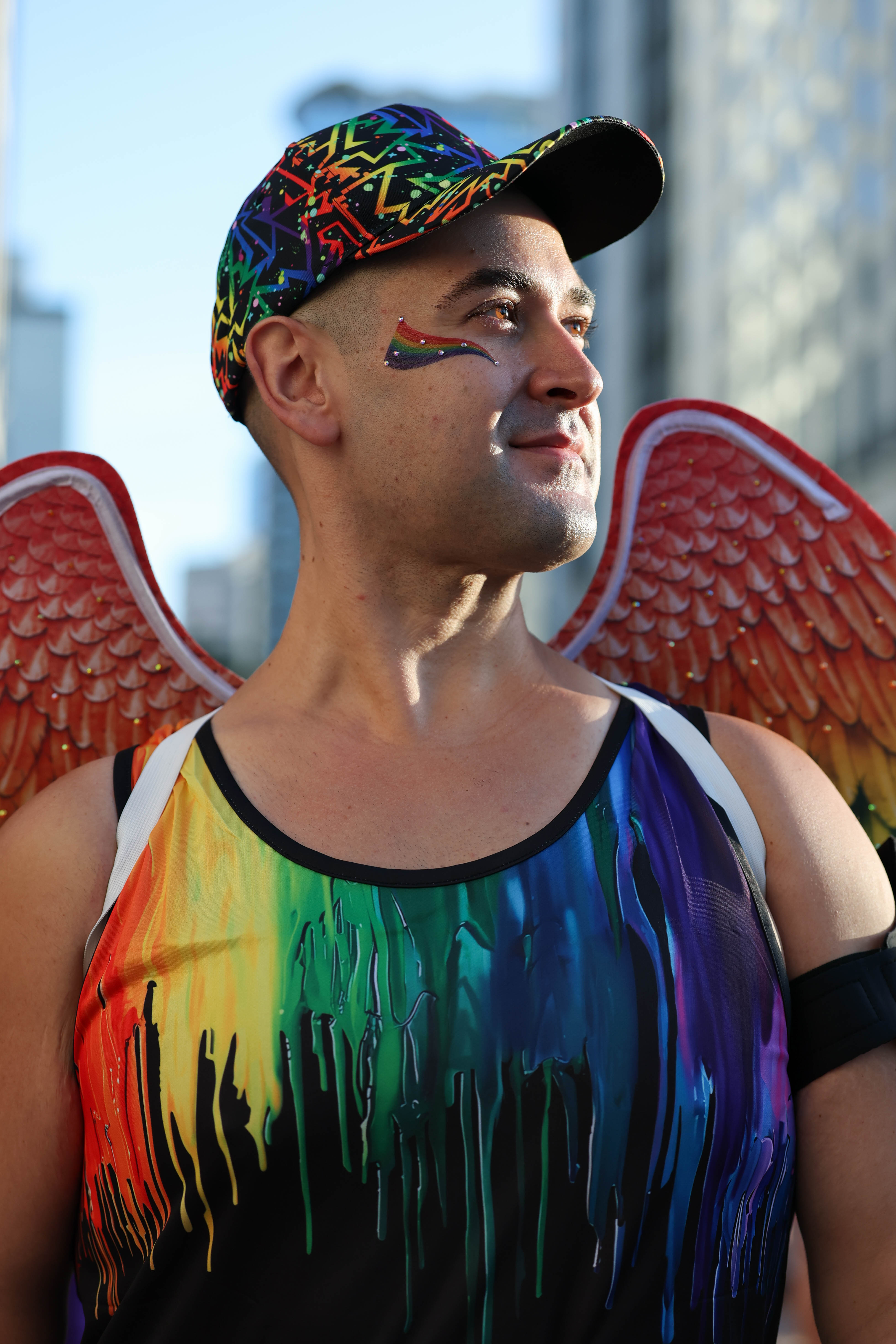 Runner Zachary Wood covered in rainbow during the 10th Annual...