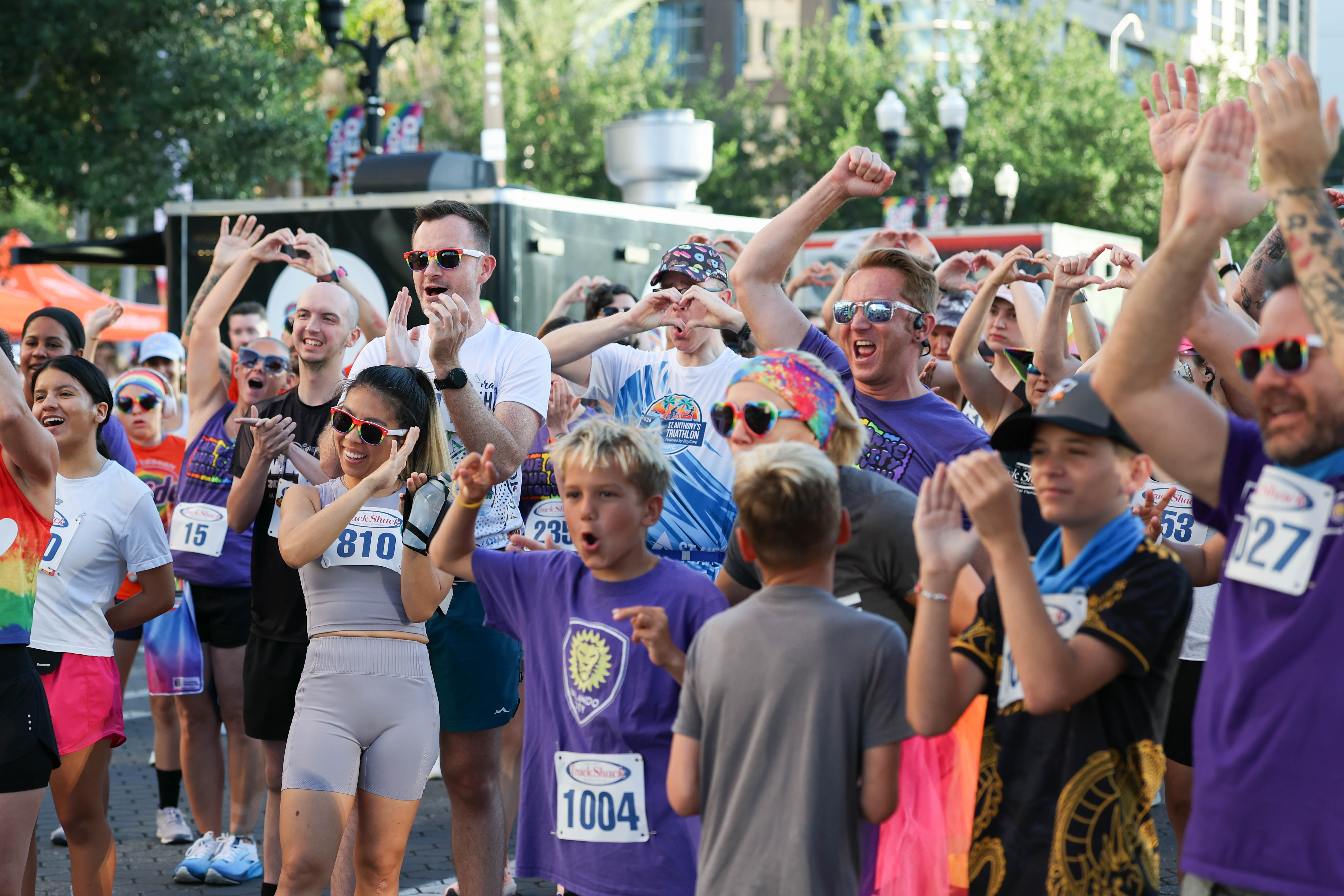 Runners get pumped up before the start of the 10th...