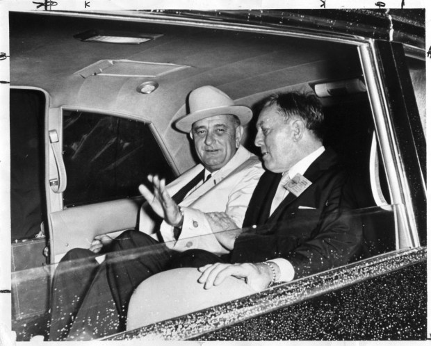 President Lyndon B. Johnson (left) and Orlando Sentinel Publisher Martin Andersen during LBJ's visit to Orlando on Oct. 26, 1964. (Orlando Sentinel File)