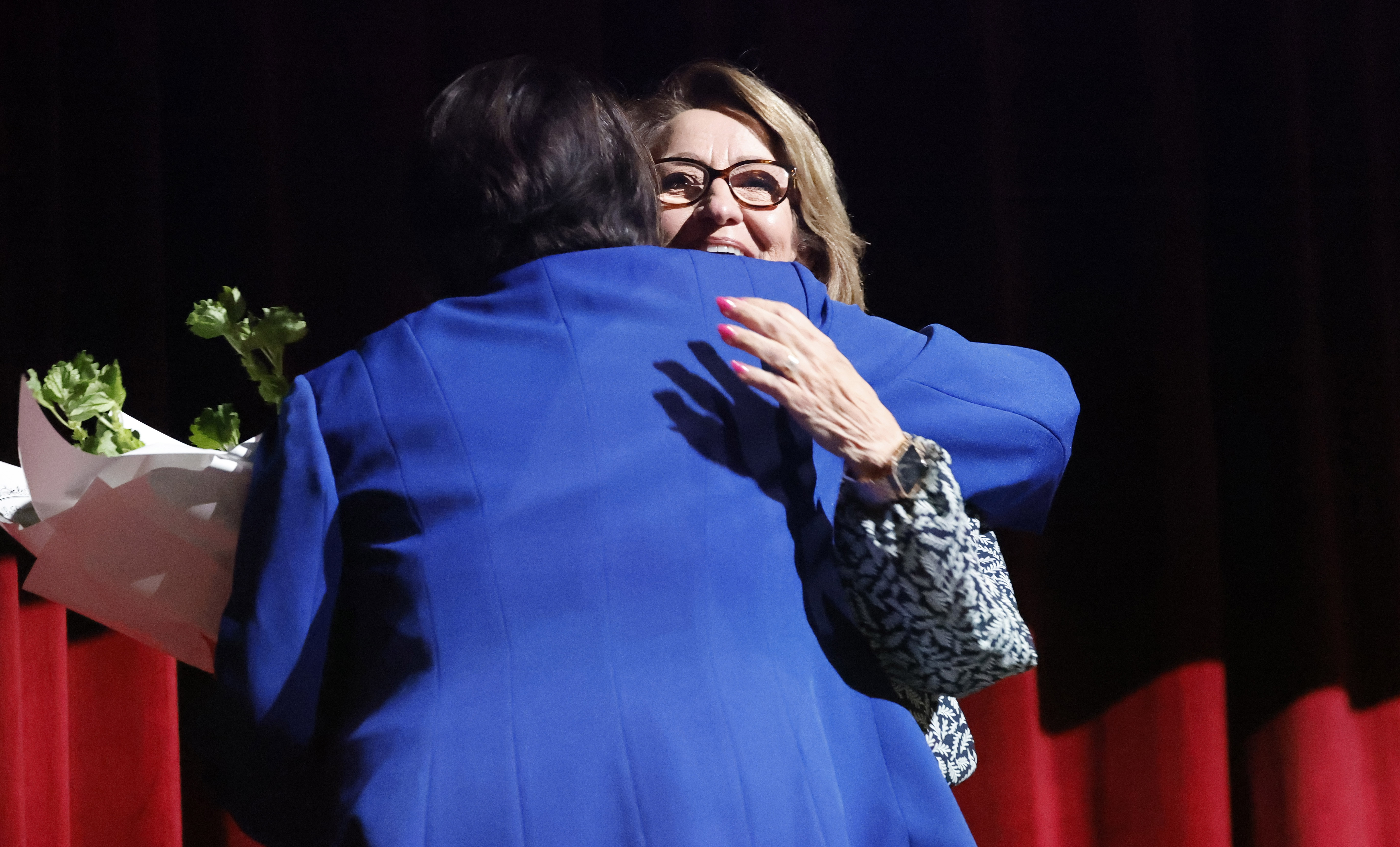 Orange County Public Schools Superintendent Maria Vazquez, left, gets a...