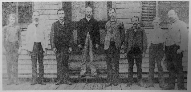 The staff of the Orange County Reporter, precursor to the Orlando Sentinel, in front of the newspaper office on Orange Avenue in 1889. They are, from left, Johnnie McRae, George C. Munger, L.S. Perkins, publisher Mahlon Gore, W. Frank Barnes, Irving S. Murray, Will McRae and Charles Munger. (Orlando Sentinel File)