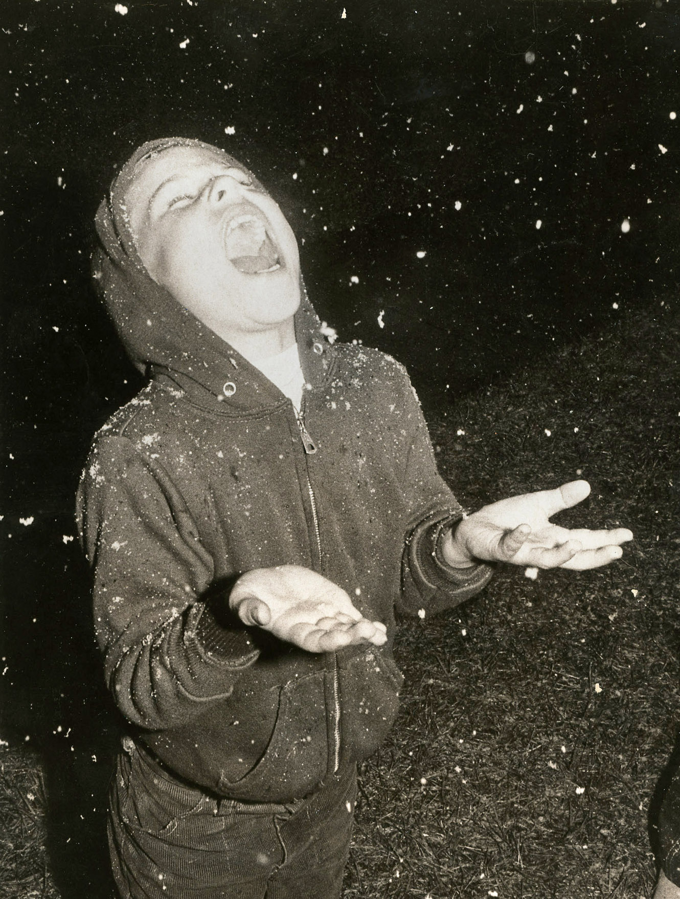 Greg Ingraham tries to catch a mouthful of snow in...