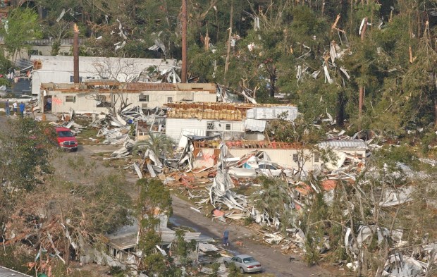 Homes were damaged and sheet aluminum wrapped around trees when a tornado hit Deland on Feb. 2, 2007. (Orlando Sentinel file)