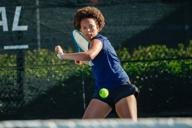 Lake Nona tennis senior Aspen Wooten warms up before her match in the Class 4A district tournament at the USTA National Campus in Orlando on Monday, April 13, 2026. (Rich Pope/Orlando Sentinel)