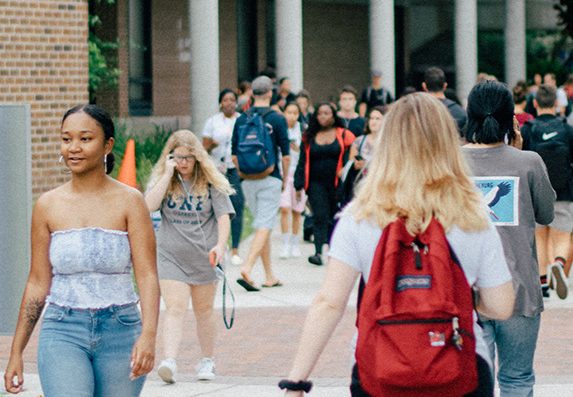 UNF students walking on campus.