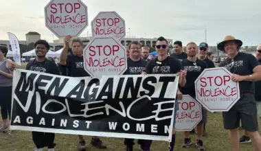 Men march to prevent domestic violence in a photo from Hubbard House
