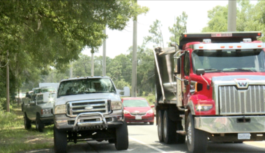 Neighbors hold truck parade to honor deceased 3-year-old before funeral