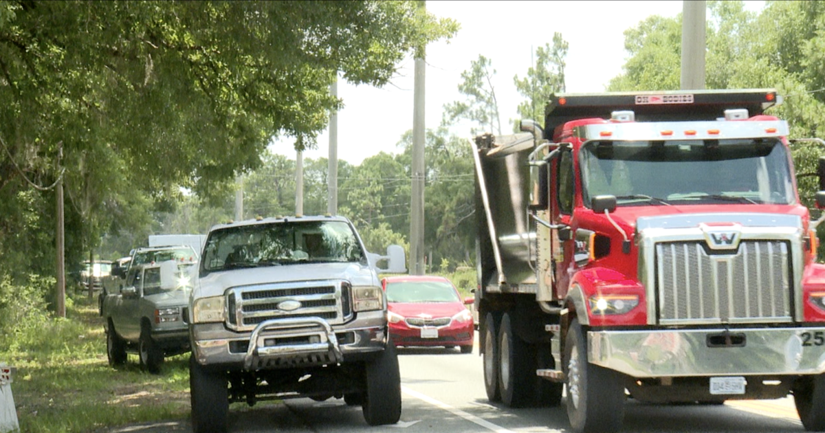 Neighbors hold truck parade to honor deceased 3-year-old before funeral