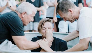 Beach baptism canceled at Sanibel site after water warning, resurrected at Estero church's location | WGCU News