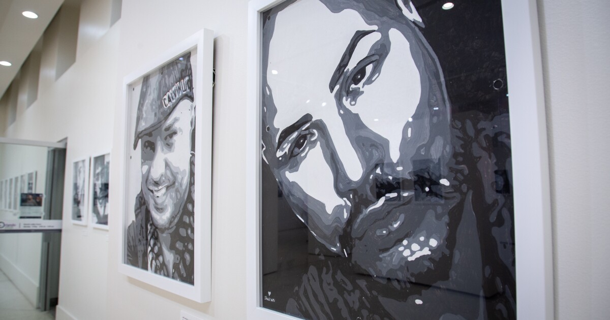 At Orlando City Hall, 49 portraits honor those killed at Pulse