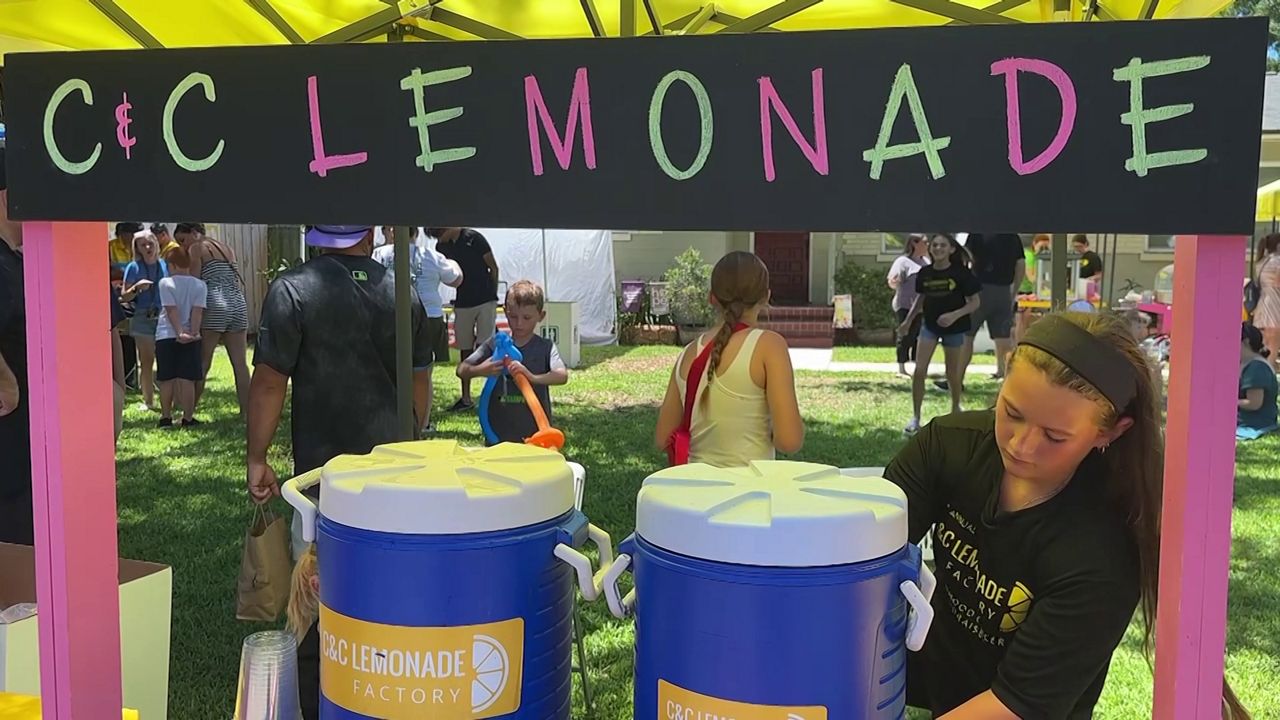 C&C Lemonade Factory, run by Caroline and Charlotte Gallagher, served about 300 cups of fresh lemonade during the milestone event. (Spectrum News)