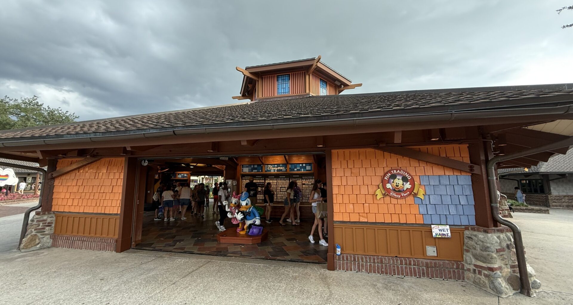 Pin Traders in Disney Springs is currently in the progress of being painted from an orange-brown to blue.